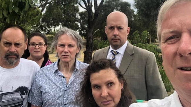 Liberal MPs David Davis (right) and Gordon Rich-Phillips (back) join outraged residents who are protesting against the Suburban Rail Loop Authority’s southern train yard at Heatherton. Picture: Facebook