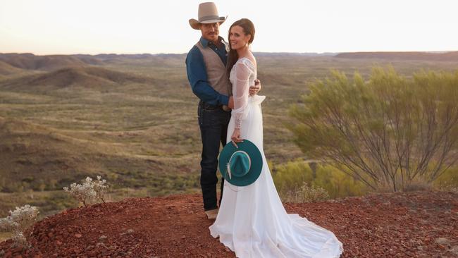 Fred Osman and Kyla Dolen celebrating a rodeo romance for the ages at Mount Isa Mines Rodeo. Picture: Pete Wallis