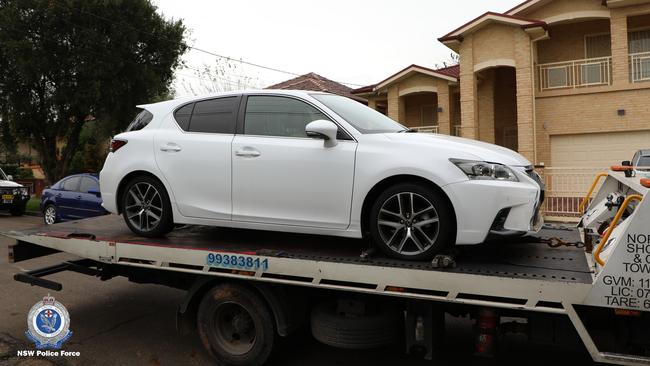 The now completely white Lexus CT200H hatchback was seized from a home in Auburn on Wednesday morning. Source: NSW Police