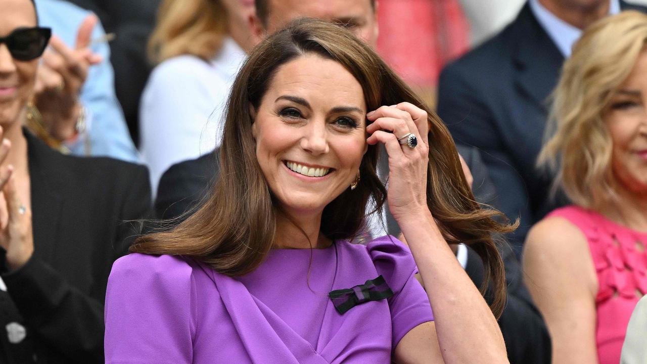 Catherine, Princess of Wales received a standing ovation when she arrived at Wimbledon. Photo by ANDREJ ISAKOVIC / AFP.