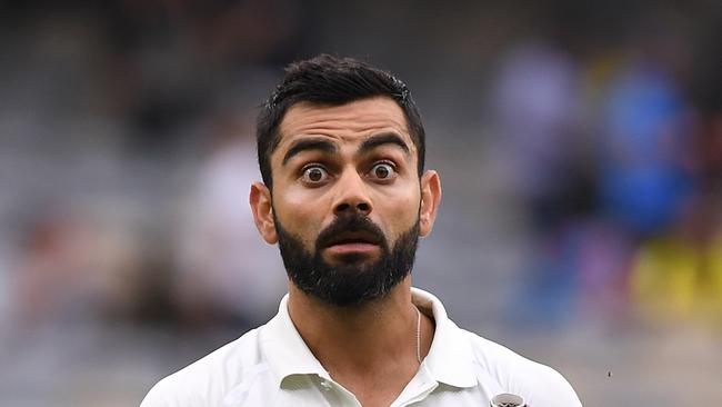 Indian batsman Virat Kohli leaves the field at stumps on day two of the second Test match between Australia and India at Perth Stadium in Perth on Saturday.