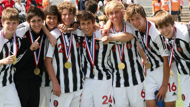 Mason Cox (right) celebrates a junior soccer title. Pictrue: Tulsa World