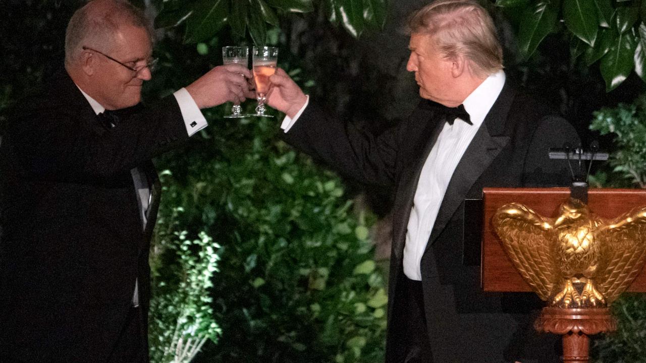 Scott Morrison and Donald Trump clinking glasses. Picture: AFP/Alex Edelman