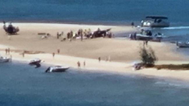 Emergency services at the scene of a two-helicopter collision at Main Beach near Seaworld. Picture: Jonathan Gyde