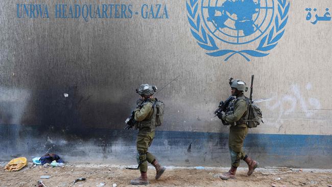 IDF soldiers outside the UNRWA headquarters in the Gaza Strip. Picture: AFP