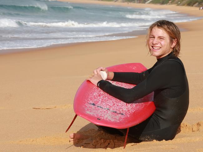 The 11-year-old had the presence of mind to give the man his board so he couldn’t drag Max under water. Picture: AAP IMAGE / MARK SCOTT