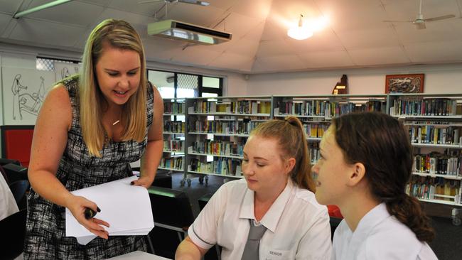 Katie O’Rourke with Year 12 St Joseph’s College students Keira Brennan and Tyra McGovern. 