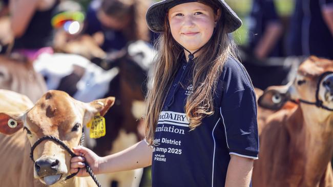 WestVic Dairy camps participant Evelyn Baroke and farm friend Mely. Photo: Nicole Cleary