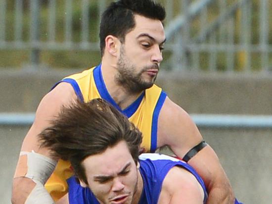 VFL footy: Footscray V Williamstown. Footscray 30 Joel Hamling under pressure.from Willi 6 Michael Gibbons.