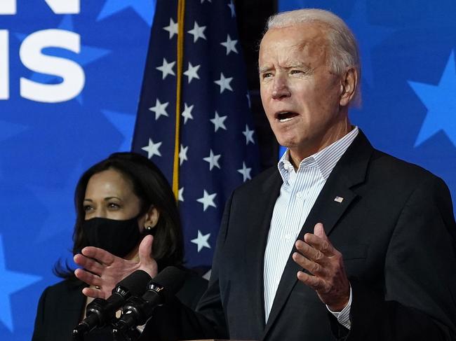 WILMINGTON, DELAWARE - NOVEMBER 05: Democratic presidential nominee Joe Biden speaks while flanked by vice presidential nominee, Sen. Kamala Harris (D-CA), at The Queen theater on November 05, 2020 in Wilmington, Delaware. Biden attended internal meetings with staff as votes are still being counted in his tight race against incumbent U.S. President Donald Trump which remains too close to call.   Drew Angerer/Getty Images/AFP == FOR NEWSPAPERS, INTERNET, TELCOS & TELEVISION USE ONLY ==