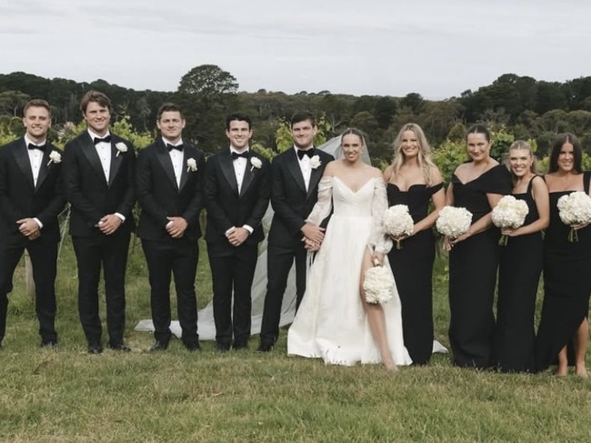 Angus and Danielle were surrounded by friends and family at their December wedding. Picture: Dear Fiore Photography