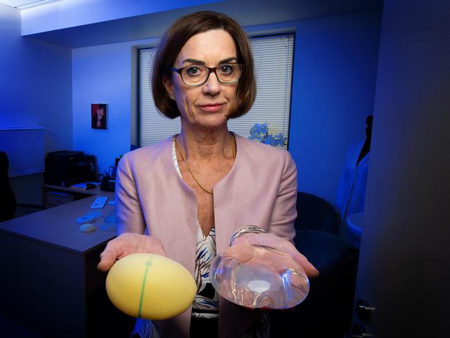 Victorian women with breast implants are at risk of getting cancer. Pictured is Dr Gillian Farrell - Aesthetic Plastic Surgeon A/Prof Gillian Farrell. (Implants pictured - textured bad, smooth/clear good). Picture: Mark Stewart