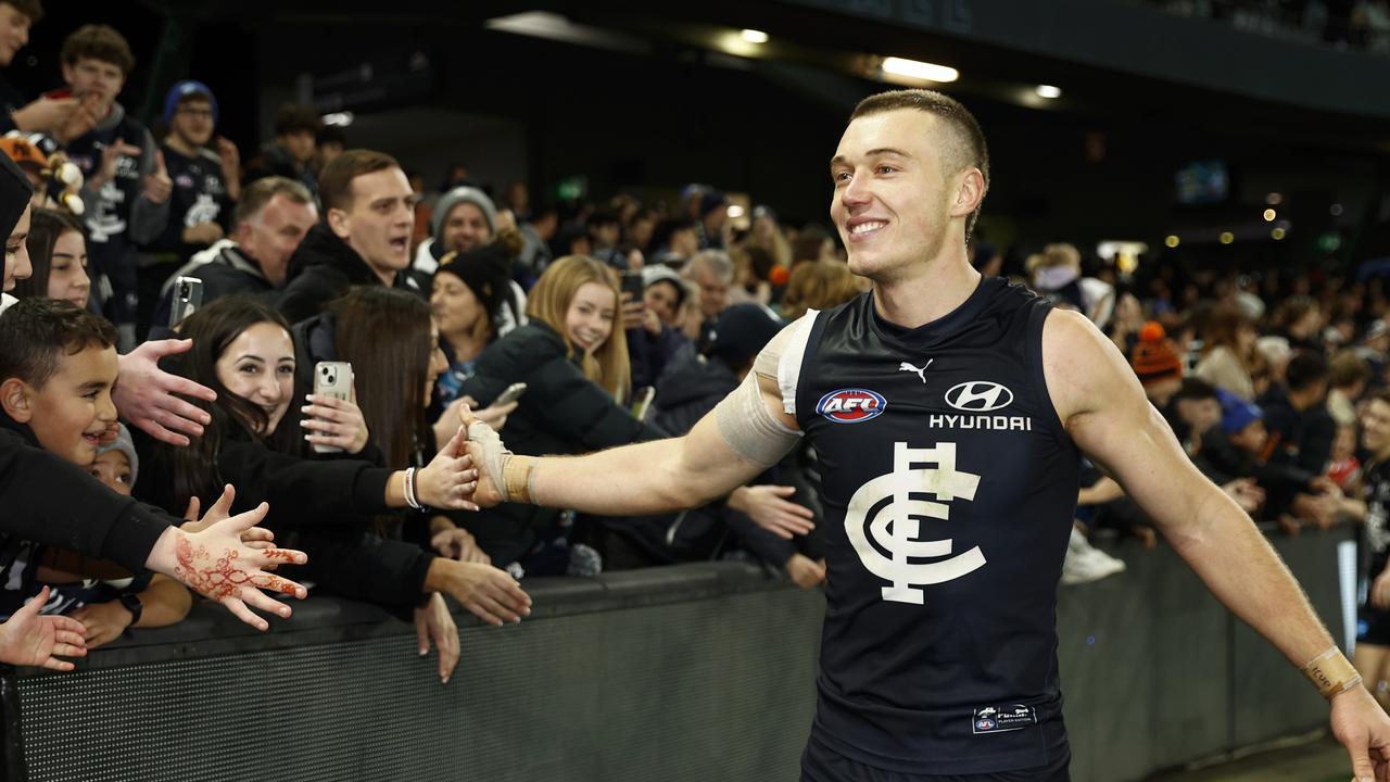 Patrick Cripps of the Blues celebrates with fans after winning the round 18 AFL match between Carlton Blues and Port Adelaide Power at Marvel Stadium, on July 15, 2023, in Melbourne, Australia. (Photo by Daniel Pockett/Getty Images)