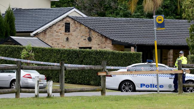 Police outside the home after the horrific discovery. Picture: Jonathan Ng