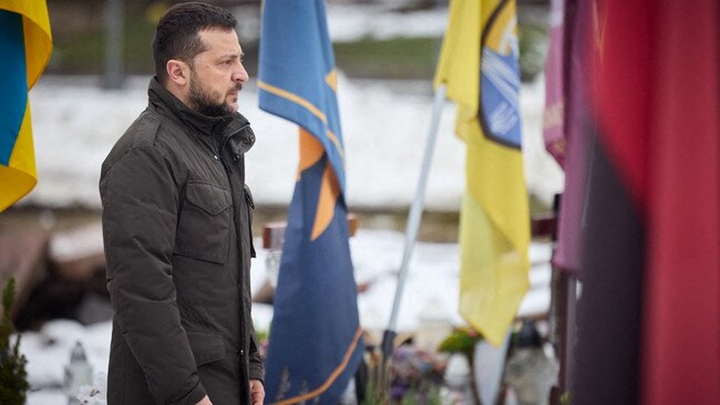 Ukrainian President Volodymyr Zelensky paying his respects at the graves of Ukrainian soldiers at the Lychakiv Cemetery in Lviv. Picture: Ukrainian Presidential Press Service/AFP