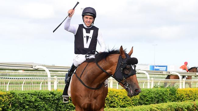 Ryan Maloney returns to scale after winning on Isotope. Picture: Trackside Photography