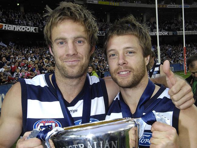 Joel Corey and David Wojcinski of the Geelong Cats celebrate after the 2007 AFL Grand Final at the MCG, between Geelong and Port Adelaide, Saturday, Sept. 29, 2007. Geelong 24.19 (163) bt Port Adelaide 6.8 (44). (AAP Image/Martin Philbey) NO ARCHIVING, NEWSPAPERS ONLY