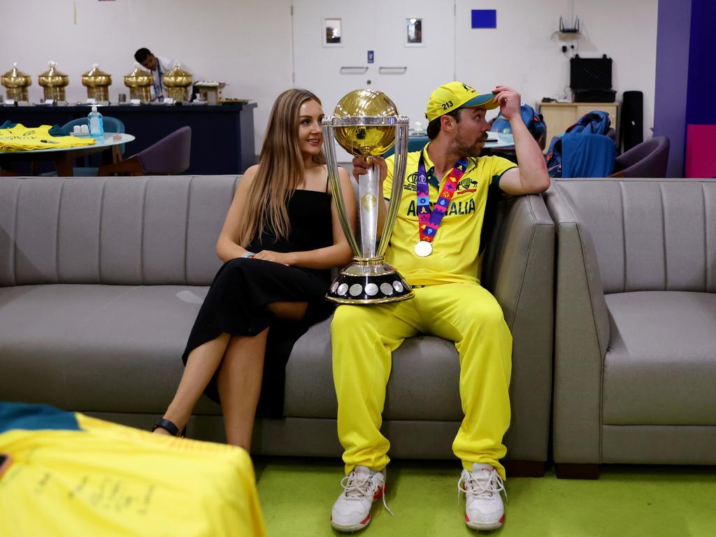 Travis Head and his wife Jessica with the World Cup trophy. Picture: Robert Cianflone/Getty Images