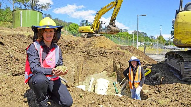 STP recycled glass: Council's Business Development Coordinator Danielle Hanigan and Stirloch Constructions Project Engineer Shane Mangan with the recycled glass being used as pipe bedding at the South Lismore Sewage Treatment Plant.