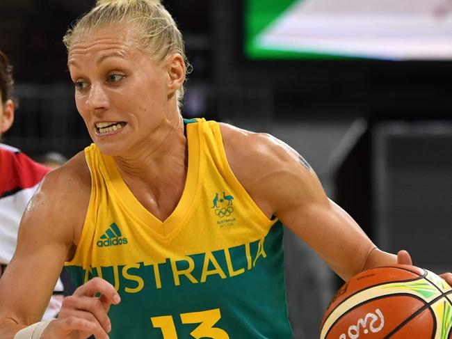 Australia's shooting guard Erin Phillips dribbles during a Women's round Group A basketball match between Japan and Australia at the Youth Arena in Rio de Janeiro on August 11, 2016 during the Rio 2016 Olympic Games. / AFP PHOTO / Andrej ISAKOVIC