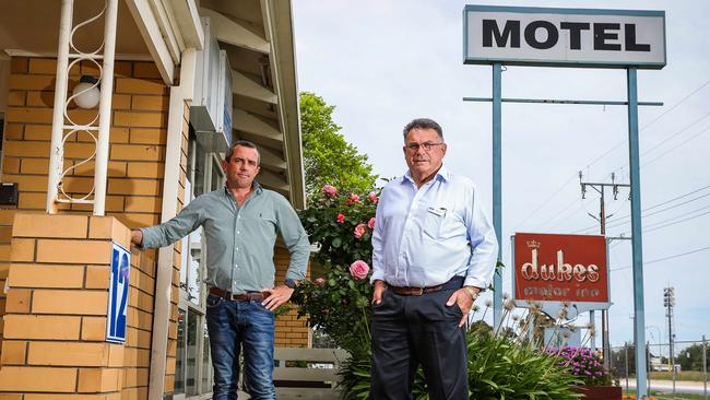 Brendon Geary, JBS assistant livestock manager, with Tatiara District Council Mayor Graham Excell in front of the Dukes Motor Inn in Bordertown, which will provide acommodation for new workers. Picture: Tom Huntley