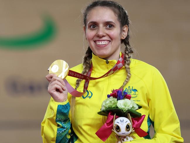 IZU, JAPAN - AUGUST 27: Gold medalist Amanda Reid of Team Australia celebrates on the podium during the medal ceremony for the Track Cycling Women's C1-2-3 500m Time Trial on day 3 of the Tokyo 2020 Paralympic Games at Izu Velodrome on August 27, 2021 in Izu, Shizuoka, Japan. (Photo by Kiyoshi Ota/Getty Images)