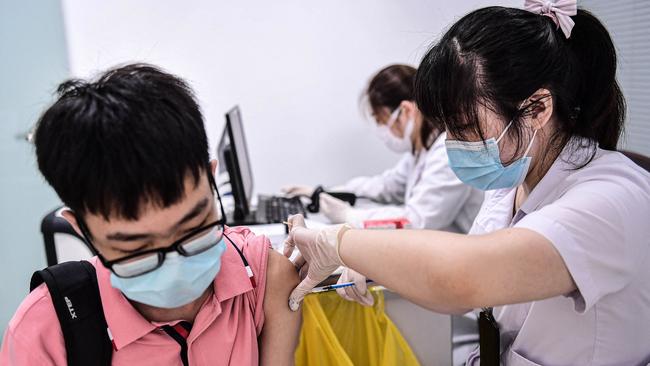 A student receives the Sinovac Covid-19 vaccine in Shenyang, in China's northeastern Liaoning province. Picture: AFP