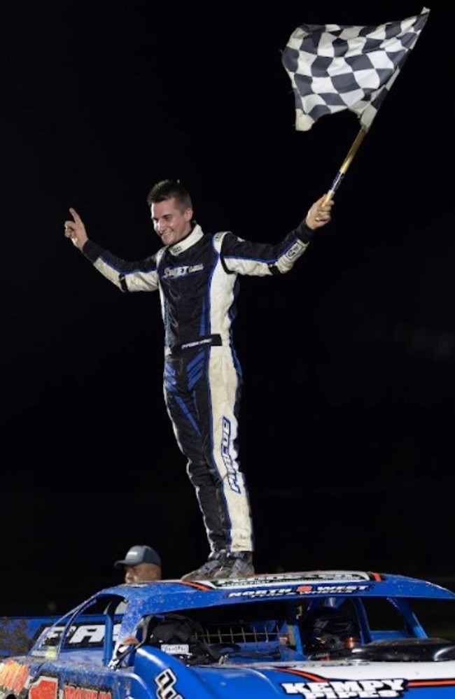 Ipswich driver Brad Pascoe celebrates his victory after claiming the $20,000 prize in the Sue Hawkings Memorial Harbour City Hustle at Gladstone. Photo: New Light Media