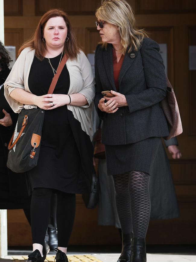 Melanie Freeman (left) leaves the Adelaide Magistrates Court on Monday. Picture: Mark Brake