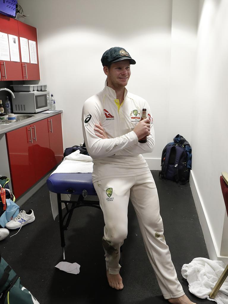 MANCHESTER, ENGLAND - SEPTEMBER 08: Steve Smith of Australia celebrate in the change rooms after Australia claimed victory to retain the Ashes during day five of the 4th Specsavers Test between England and Australia at Old Trafford on September 08, 2019 in Manchester, England. (Photo by Ryan Pierse/Getty Images)