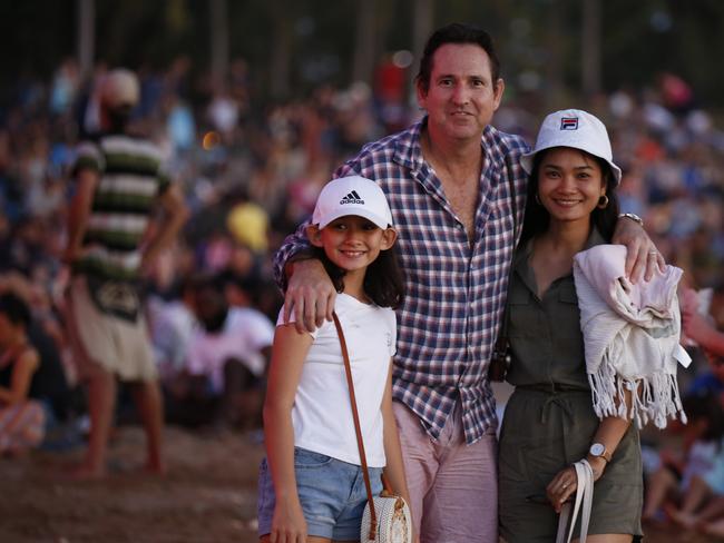 Michael , Khemeka and Layla Totham joined thousands of Territorians along Mindil Beach to celebrate Territory Day. Picture: Glenn Campbell