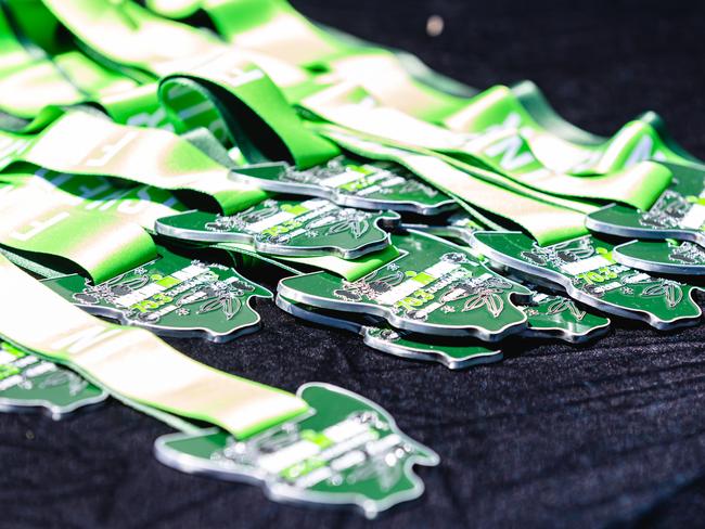 Tasmania 70.3 Ironman medals at the finish line Picture: Linda Higginson