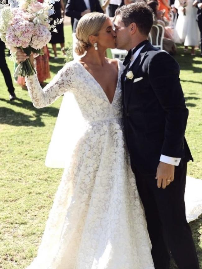 The couple seals the deal with a kiss. Picture: Beck Rocchi Photography