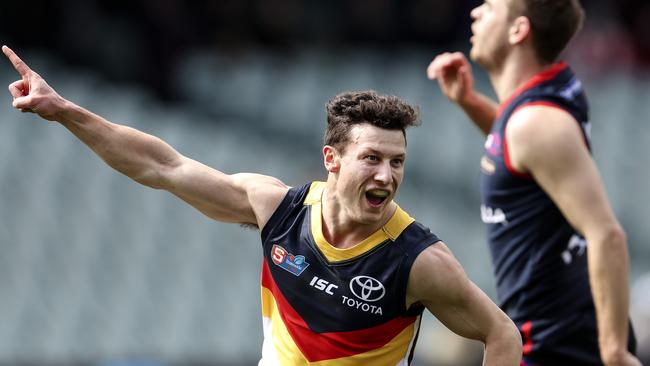 James Mathews celebrates one of his four goals for the Crows in their 2019 SANFL first semi-final win against Norwood at Adelaide Oval. Picture: Sarah Reed