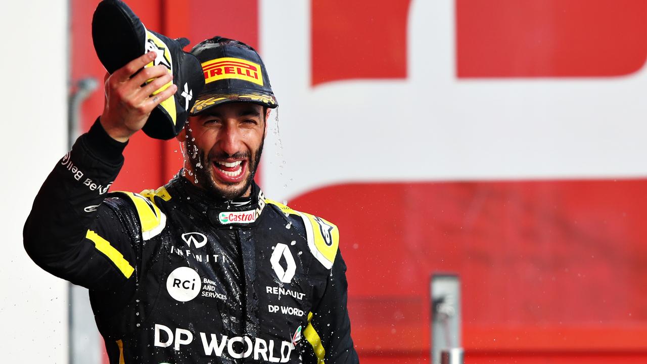 IMOLA, ITALY - NOVEMBER 01: Third placed Daniel Ricciardo of Australia and Renault Sport F1 celebrates on the podium with a shoey during the F1 Grand Prix of Emilia Romagna at Autodromo Enzo e Dino Ferrari on November 01, 2020 in Imola, Italy. (Photo by Mark Thompson/Getty Images)