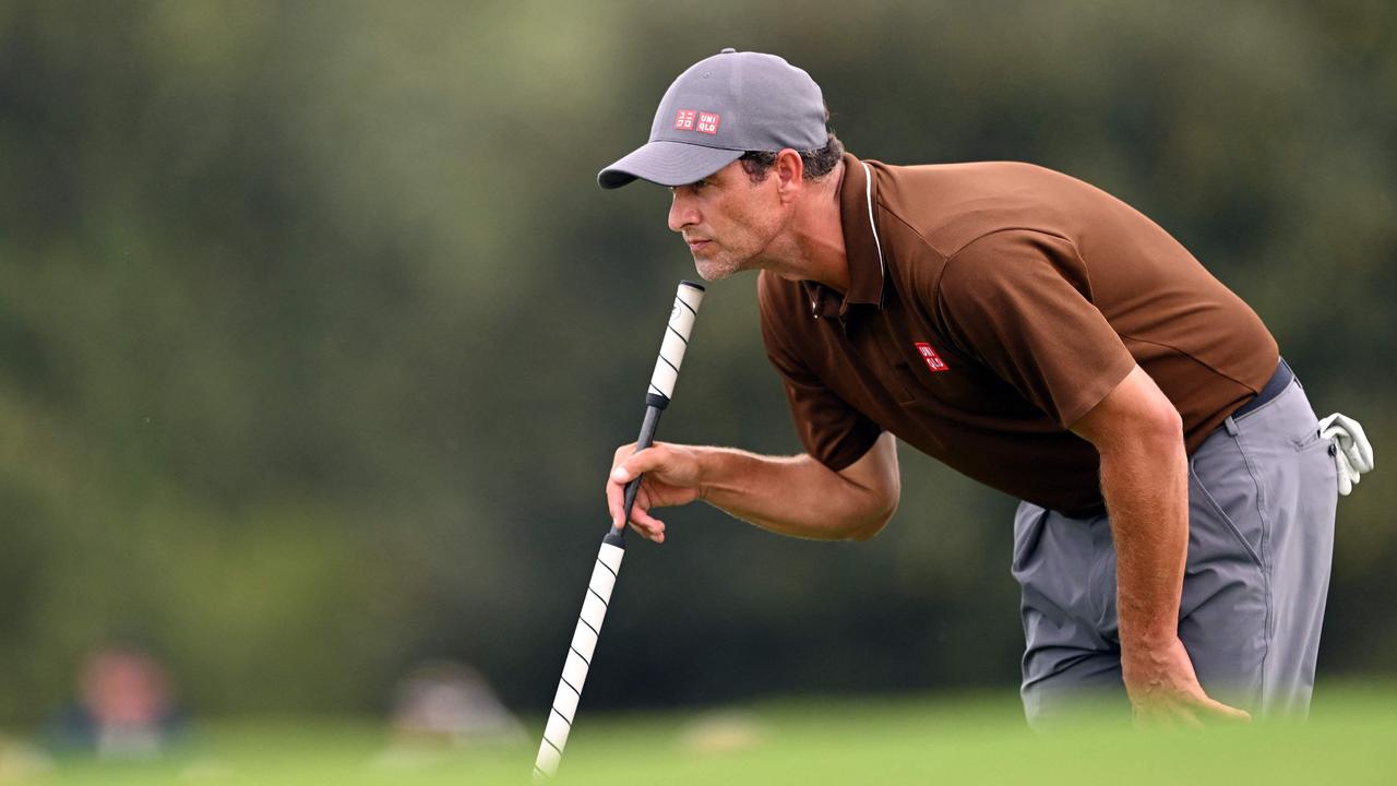 Adam Scott lines up a putt on the 18th green during the first round of the 2023 Masters Tournament at Augusta National Golf Club . Picture: Getty Images