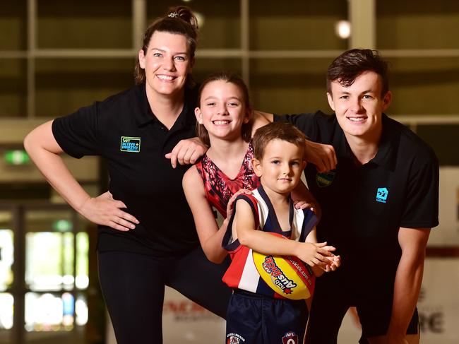 Get Active Expo Ambassadors Mia Murry and Jake Doran pictured with Jaeda Flores, 10, Townsville PCYC Gymnastics and Spencer Brischetta, 5, Townsville AFL, ready to attend this weekends Get Active Expo. Picture: Shae Beplate.