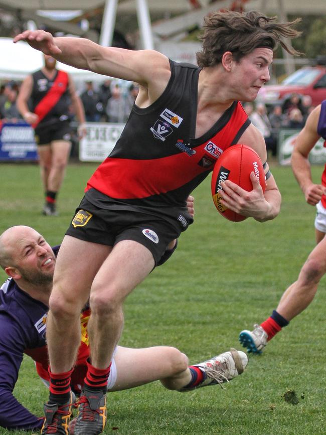 Nathan Croft evades a tackle during last year’s RDFL grand final. Picture: Aaron Cook