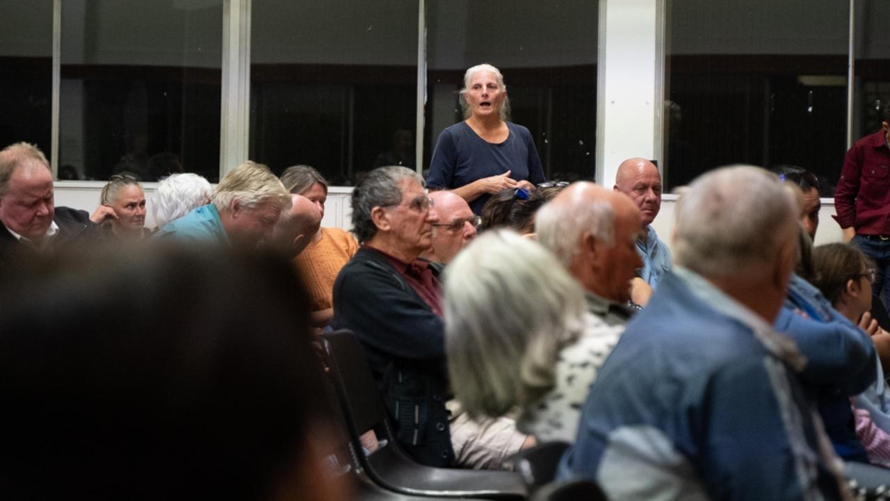 Mardi Brady stands up to ask a question about her property. More than 100 people turned up to Kilkivan Town Hall in response to Powerlink's selected corridor of a transmission line from Borumba Dam to Woolooga Substation in late April. Wednesday, May 3, 2023. Picture: Christine Schindler