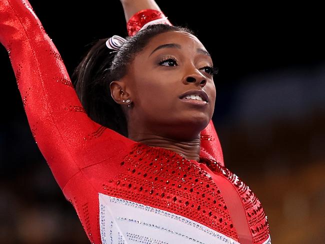 A visibly shaken Simone Biles after barely landing the vault attempt that convinced her to withdraw in Tokyo. Picture: Laurence Griffiths/Getty Images