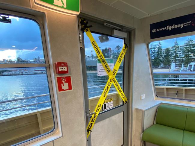 The top front portside emergency door of the Balmoral is taped and locked shut.