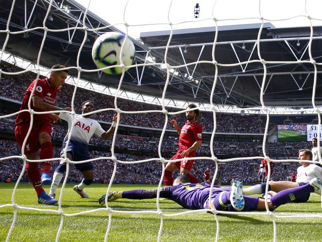 LONDON, ENGLAND - SEPTEMBER 15:  Roberto Firmino of Liverpool scores his team's second goal past Michel Vorm of Tottenham Hotspur during the Premier League match between Tottenham Hotspur and Liverpool FC at Wembley Stadium on September 15, 2018 in London, United Kingdom.  (Photo by Julian Finney/Getty Images)