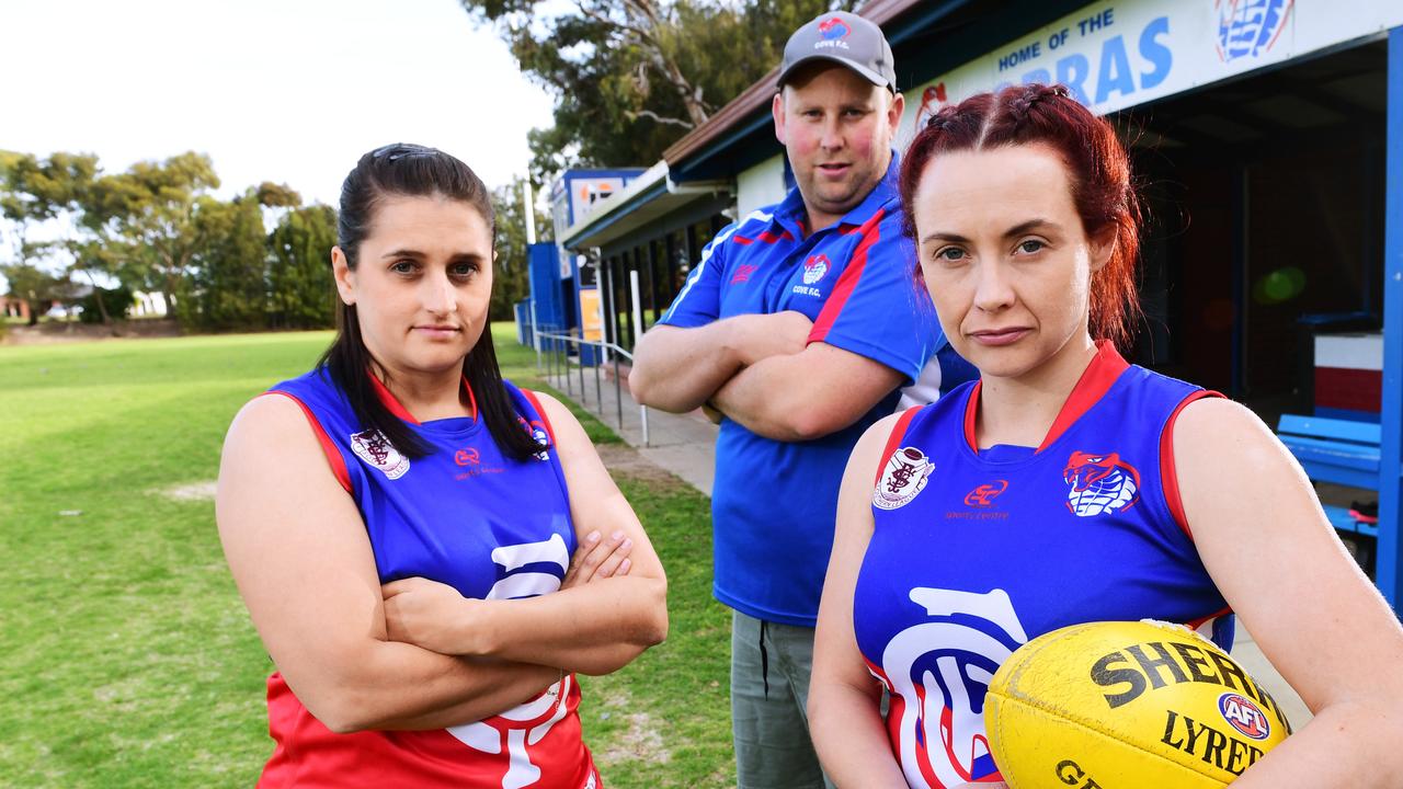 Cove womens footballers Josie Smith , coach Brett Baldey and captain Dana O'Brien outside the Cove Football Club Thursday September 26,2019.Picture Mark Brake