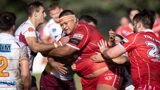 Jurado Smith charges into the Thirlmere defence. Pics by Julian Andrews.