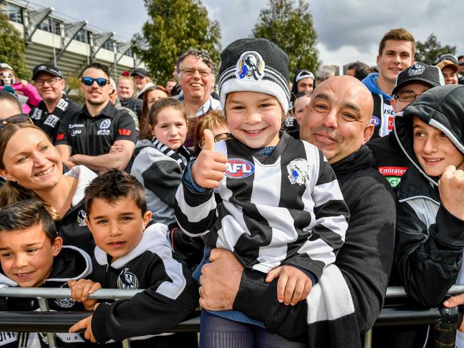 Collingwood open training session. Fans turn out in their thousands to watch Collingwood train ahead of the Grand Final. Mjay Emini 4 gives the thumbs up. Picture: Jake Nowakowski