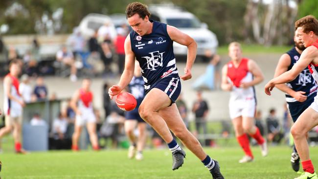 SFL GRAND FINAL: Noarlunga (navy) v Flagstaff Hill at Hickinbotham Oval, Noarlunga.(N) Nicholas Mott(AAP Image/ Keryn Stevens)