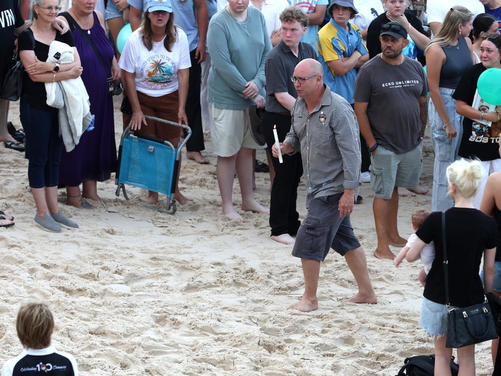 Hundreds of people have gathered at Bribie Island for a vigil to honour 17-year-old shark attack victim Charlize Zmuda. Picture: David Clark