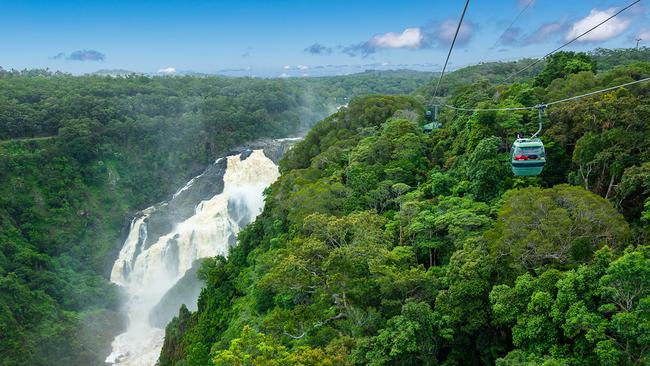 A gondola approaches Barron Falls on the Skyrail Rainforest Cableway which has reported an increase in visitor numbers over the Easter school holidays. Supplied: Tourism and Events Queensland