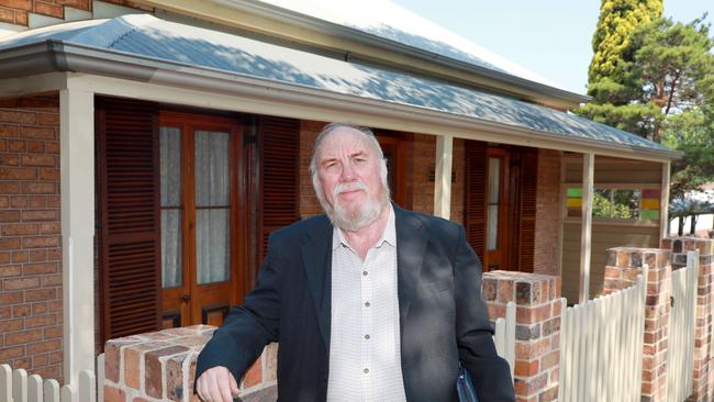 Long-time Parramatta resident and former mayor Laurie Bennett at the home where he grew up. It was built circa 1870 and is now a psychology practice. Picture: Angelo Velardo