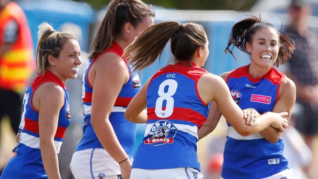 Nicole Callinan celebrates a goal with her teammates in the win over Collingwood. Picture: Getty Images